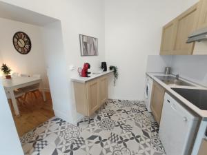 Appartements Sources des Celestins - Gare - Pole universitaire - labellise Clevacances 3 etoiles : photos des chambres