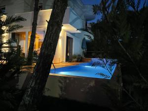 Beachfront villa in Qerret beach with a private pool