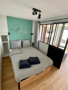 Appartements Les Vies en Rose : photos des chambres