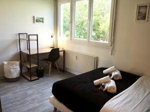 Appartements Saturne YourHostHelper : photos des chambres