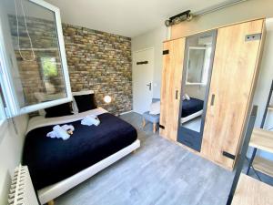Appartements Saturne YourHostHelper : Appartement 3 Chambres