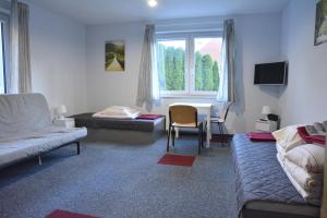 Quadruple Room room in Dom Goscinny Skarpa