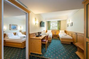 Family Room (2 Adults + 2 Children up to 15 years) room in Hotel Alpina