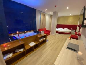 Junior Suite with Jacuzzi and Side Sea View room in Hotel Alion