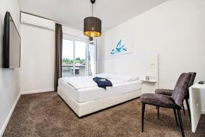 Hotel Velden - 24 Checkin Zimmer im Zentrum