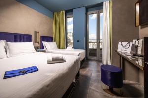 Triple Room with Balcony and View room in HD8 Hotel Milano