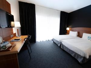 Hotels Kyriad Hotel Clermont Ferrand Centre : photos des chambres