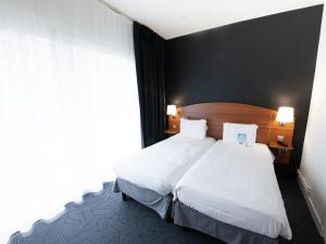 Hotels Kyriad Hotel Clermont Ferrand Centre : photos des chambres
