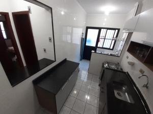 Ap Vila Guilhermina com quintal (Praia Grande)