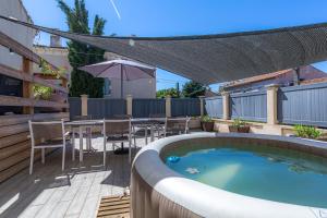 Appartements Appartement Domloc : photos des chambres