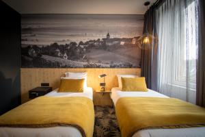 Hotels L' Hotel & Spa Ribeauville- Haut-Koenigsbourg : photos des chambres