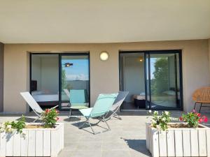 Appartements Duplex KIARA - plage a pied - terrasse - WIFI - Clim : photos des chambres