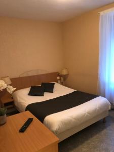Hotels LE LOBREONT : photos des chambres
