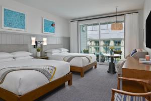 Queen Room with Two Queen Beds and Partial Ocean View room in The Seabird Resort - part of Destination by Hyatt