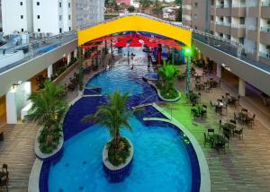 Hospedagem ao lado Thermas dos Laranjais no Enjoy Olímpia Park Resort para famílias