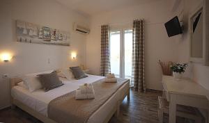 Two-Bedroom Apartment room in Anixis Studios