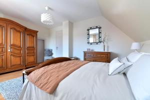 Maisons de vacances Au Pied du Vignoble : photos des chambres