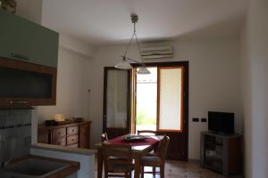 Casa Vacanze Libeccio - Villetta con giardino e piscina condominiale