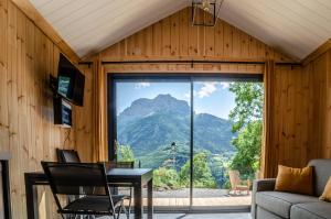 Les Petits Ecrins - Chalets avec spas privatifs : photos des chambres