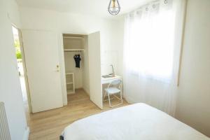 Appartements HOME GANUSHA COSY 3 CHAMBRES PARKING GRATUIT BALCON : photos des chambres