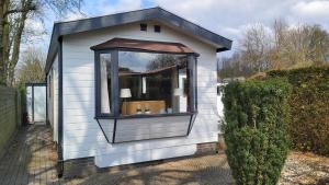 Cosy Garden familie chalet tot 4 personen op de Veluwe Bungalowpark De Kern