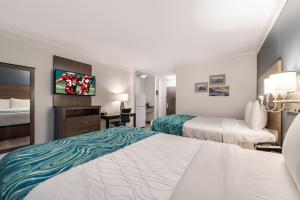 Deluxe Room with Two Double Beds with Balcony Smoke Free room in Le Voyageur - a Red Collection Hotel