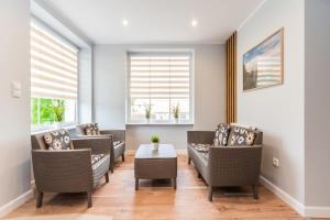 Bryza Jantar apartamenty z sauną & domki z kominkami