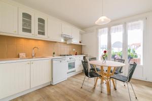 Appartement Climatisé 7mn Centre Ville 95M2 4 Adultes Bébé Garage Sous sol Arrivée Autonome