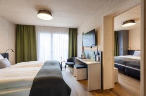 Two-Bedroom Apartment room in JUFA Hotel Savognin