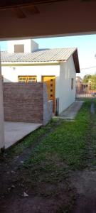 Pousada ideal -casa 3 nos fundos