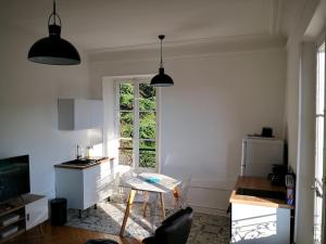 Appartements Studio moderne,face au parc. : photos des chambres