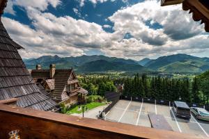 Two Bedroom Duplex Apartment with Balcony, Fireplace and Mountain view room in Osada Kościelisko