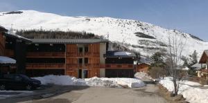 Appartements Studio 2 alpes, lumineux plein ouest, balcon, parking : photos des chambres