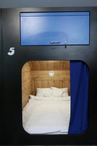 Double Room with Shared Bathroom room in Kapsuła Hostel