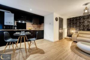 Appartements Spa et Sauna au coeur de Metz (unenuitametz) : photos des chambres