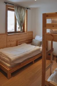 Chalets La Saulire - SUPERBE CHALET MODERNE 4* DOMAINE ALPE D'HUEZ : photos des chambres