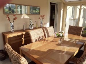 Gîte "Au Ptit Tourois" de plain-pied tout confort avec véranda proche dOmaha Beach et de Bayeux accueillant les animaux