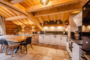Chalets Chalet ''la cabane o Pierres'' 12 pers spa et sauna : photos des chambres