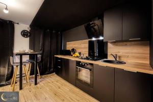 Appartements Le Loft Spa au coeur de Metz (unenuitametz) : photos des chambres