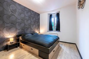 Appartements Appart'hotel de la Roseraie : photos des chambres