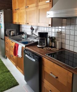 Hirsihuvila, sauna ja kylpyamme, levollista olemista