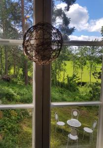 Hirsihuvila, sauna ja kylpyamme, levollista olemista