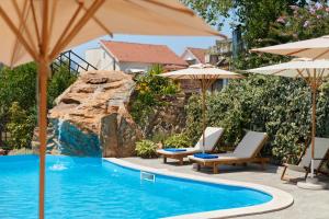 Moderna Luxury Apartments with HEATED pool