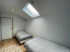 Appartements L'Ecole Buissonniere : photos des chambres