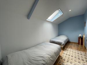 Appartements L'Ecole Buissonniere : photos des chambres