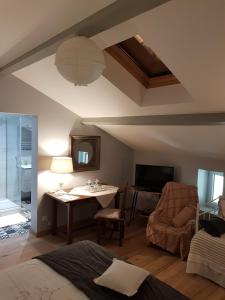 B&B / Chambres d'hotes Sous les Remparts : photos des chambres