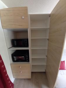 Appartements Studio 4 personnes centre Superbesse : photos des chambres