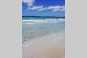 Trilocale vista mare con piscina a Badesi