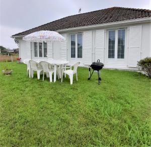 Maisons de vacances L'Opaline, Jolie Maison avec Jardin 6 pers,10km Honfleur, linge et internet inclus : photos des chambres