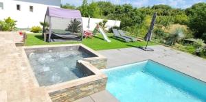 Villas Magnifique villa au calme avec piscine et jacuzzi chauffees : photos des chambres